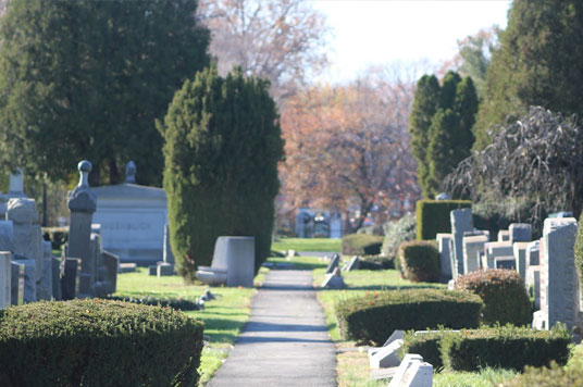 Photo of grave with sinking foundation